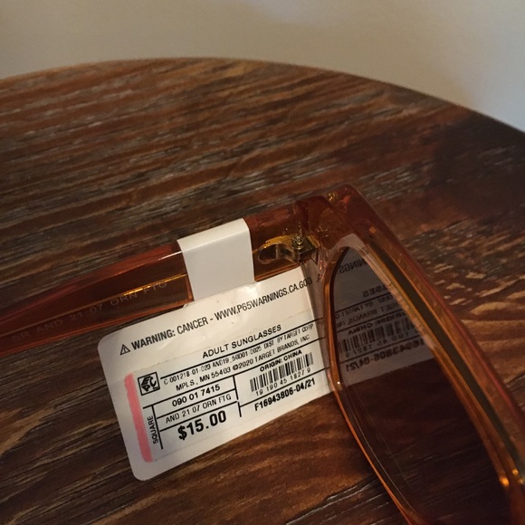 Women’s Shiny Plastic Unique Shape Sunglasses - a new day light orange - Picture 3 of 5